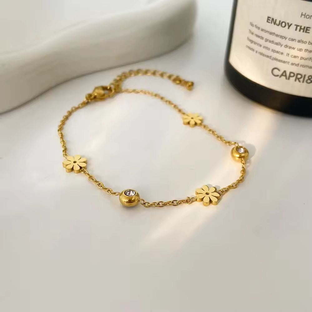 Stylish Gold Plated Flower & Crystal Charm Bracelet