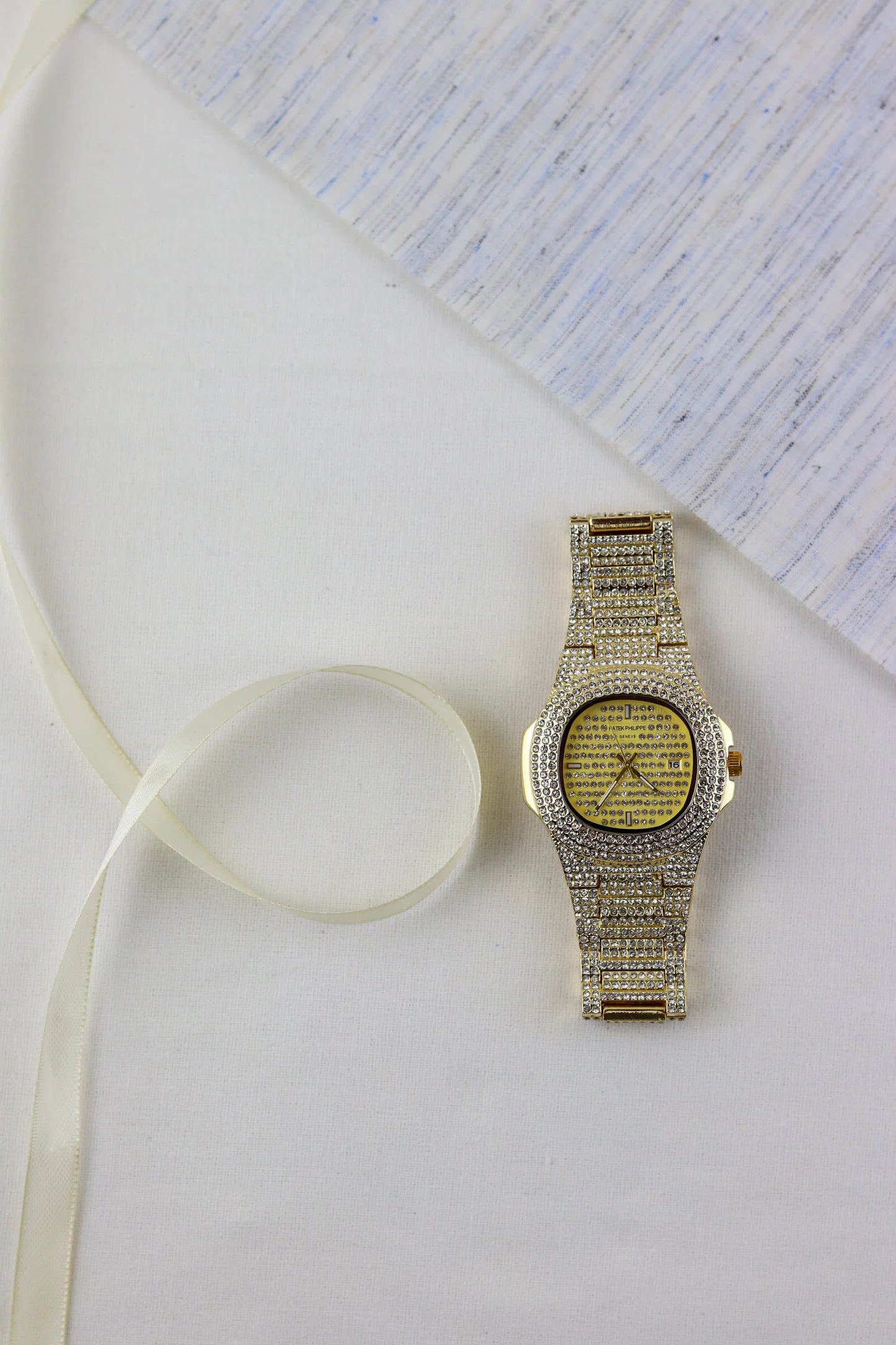 Patek Glimmering Gold Timepiece